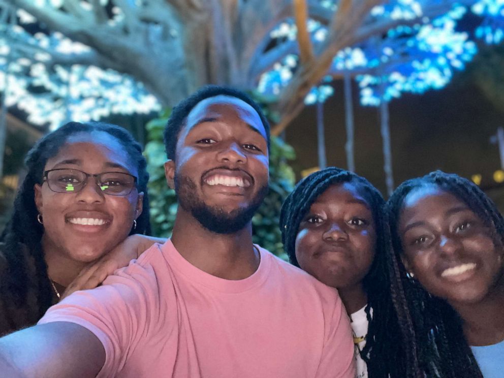 PHOTO: Tre Burrows, center, and Jenny Burrows, far left, are caring for their younger sisters, Zoey and Sierra, following their mom's death due to COVID-19.