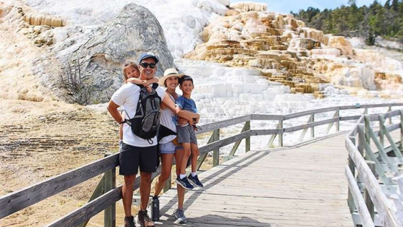 PHOTO: Lauren and Kyle Mochizuki, of California, pose with their two children.