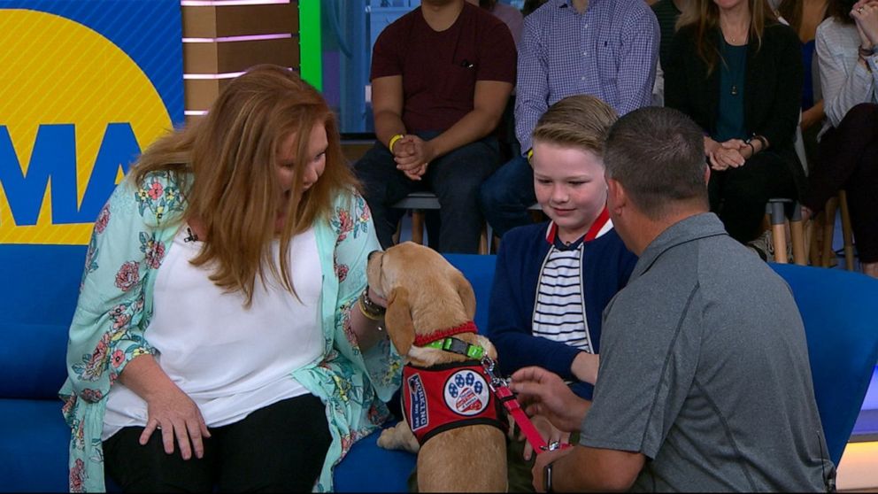 PHOTO: Brooke Morgan and her 9-year-old son Eli, who has type 1 diabetes, meet their new diabetes alert dog.