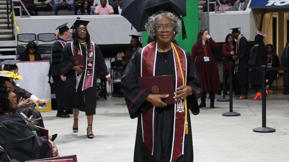 Donzella Washington, 80 of Birmingham, Alabama, walks on her graduation day at Alabama A&M University on Dec. 6, 2019.