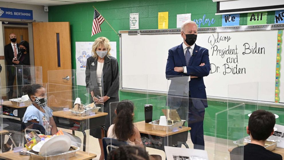 PHOTO: President Joe Biden and First Lady Jill Biden visit the classroom of fifth-grade teacher Cindy Bertamini, at Yorktown Elementary School in Yorktown, Va. on May 3, 2021. 