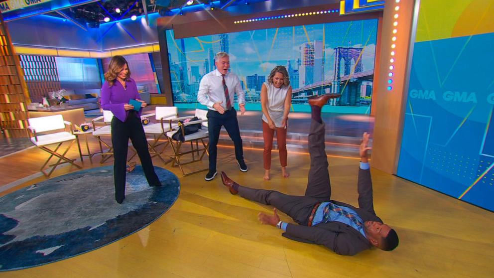 PHOTO: "Good Morning America" co-anchor Michael Strahan imitates the viral "Dancing With the Stars" leg lift move performed by Witney Carson and Danny Amendola.