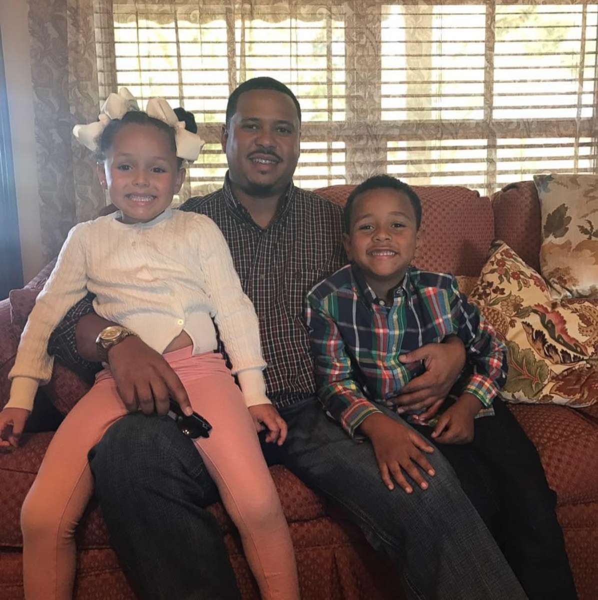 PHOTO: Eddie Lewis III poses with his children in this undated family photo.