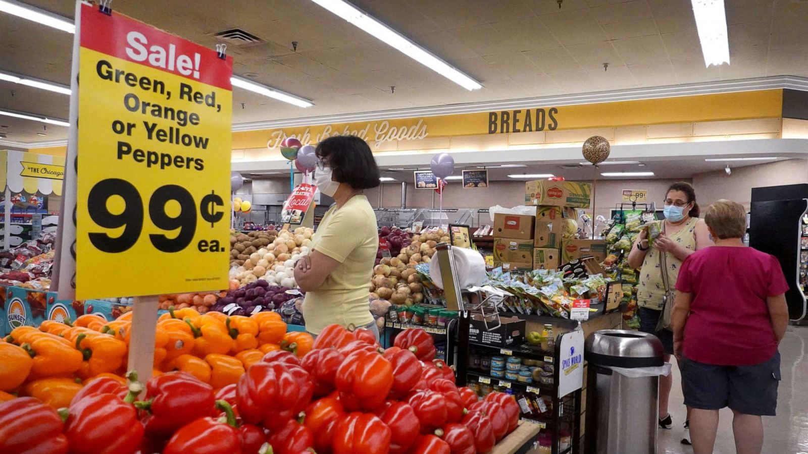 PHOTO: Customers shop for produce at a supermarket in Chicago, June 10, 2021.