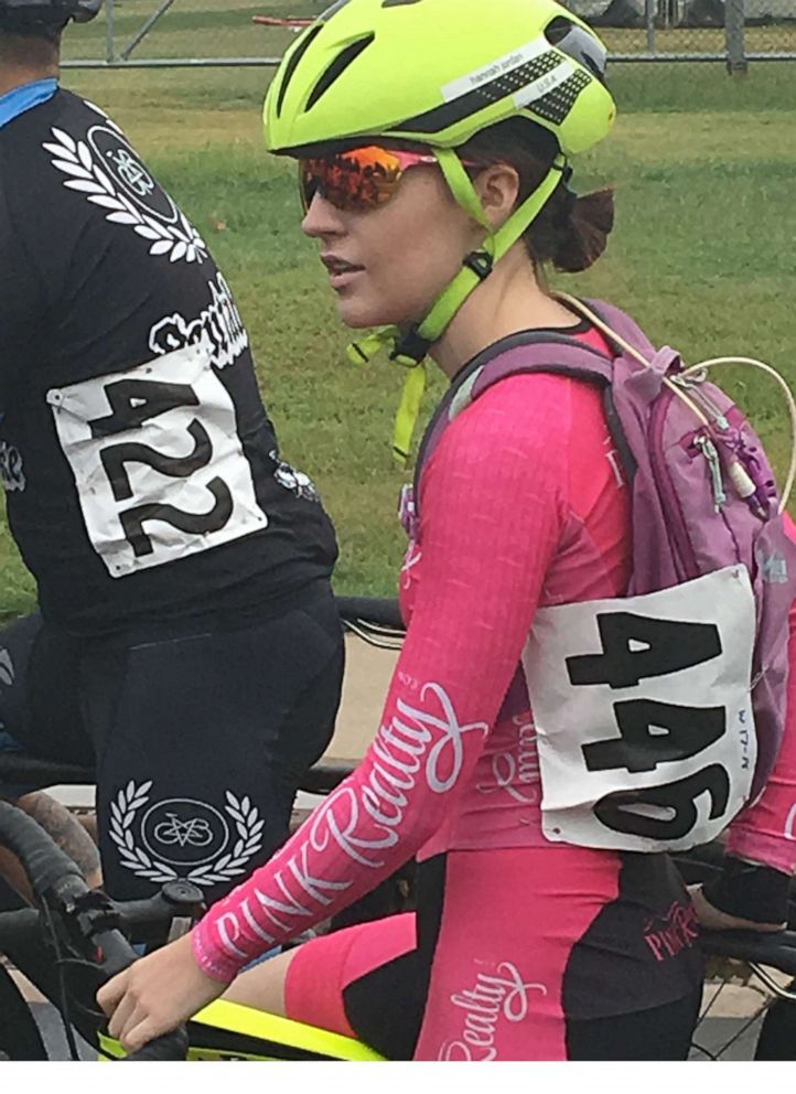 PHOTO: Hannah Jordan, 18, wears a G-tube in a backpack while cycling.