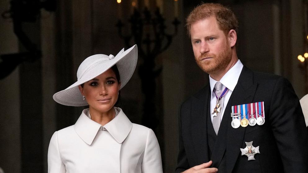 Prince Harry and Meghan Markle, Duke and Duchess of Sussex leave after a service of thanksgiving for the reign of Queen Elizabeth II at St Paul's Cathedral in London, Friday, June 3, 2022.