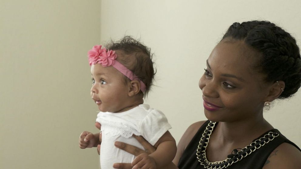 PHOTO: Candace Farris holds her daughter Victory.