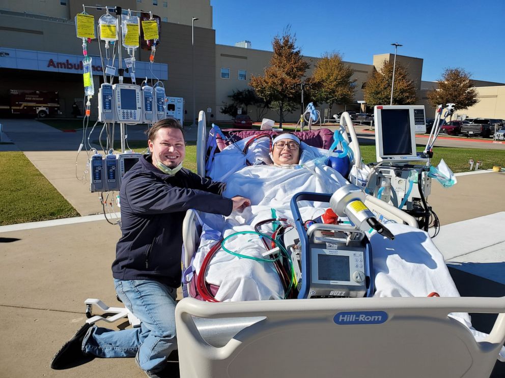 PHOTO: Jazmin Kirkland, of Texas, poses with her husband Kody while hospitalized during her battle with COVID-19.