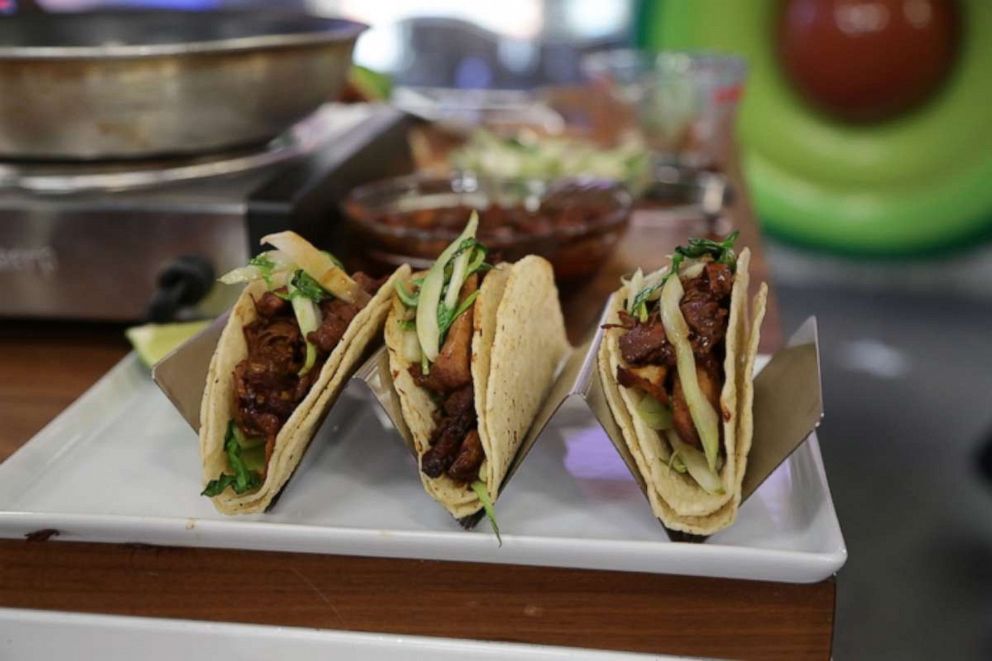 PHOTO: Chef Jordan Andino shares his recipe for hard tacos stuffed with sauteed bok choy and topped with chicken adobo.