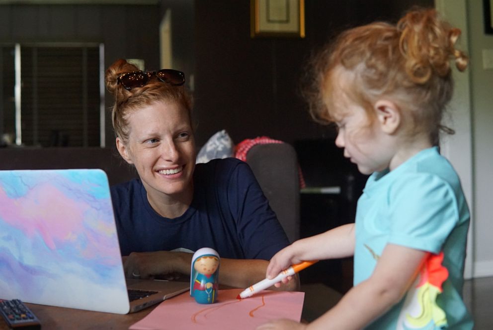 PHOTO: Katherine Musacchio Schafer works from home while caring for her 2-year-old daughter Francesca.