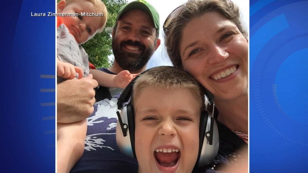 PHOTO: Laura Zimmermann, of Chicago, poses with her husband and two children.