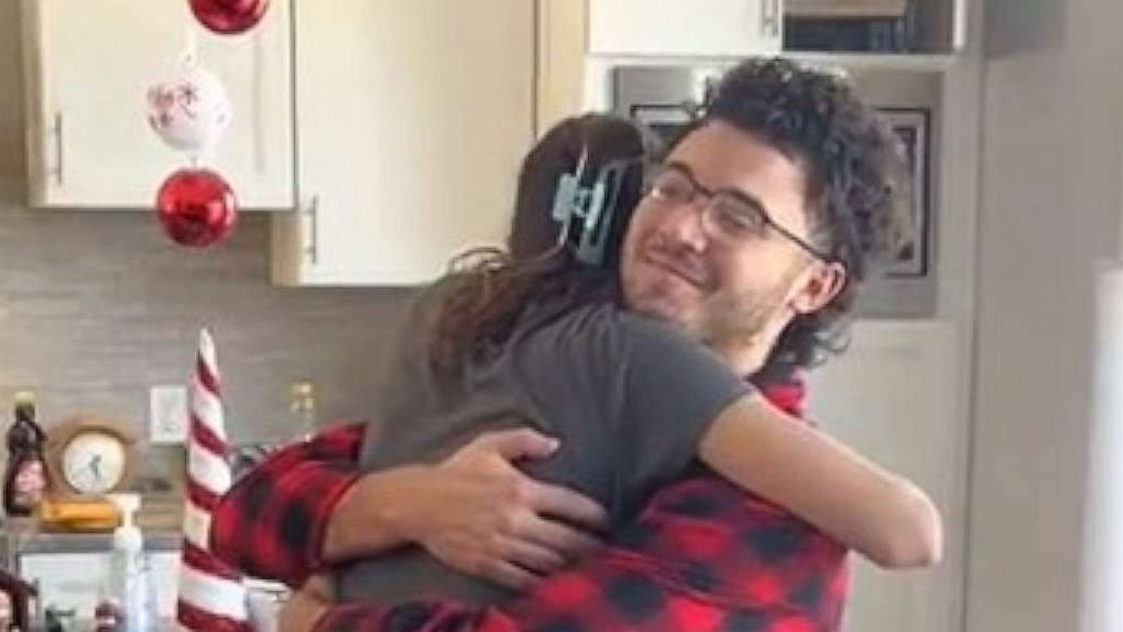 PHOTO: Anthony Leal hugs his sister Lauren after surprising her with the news he paid her student loan debt.