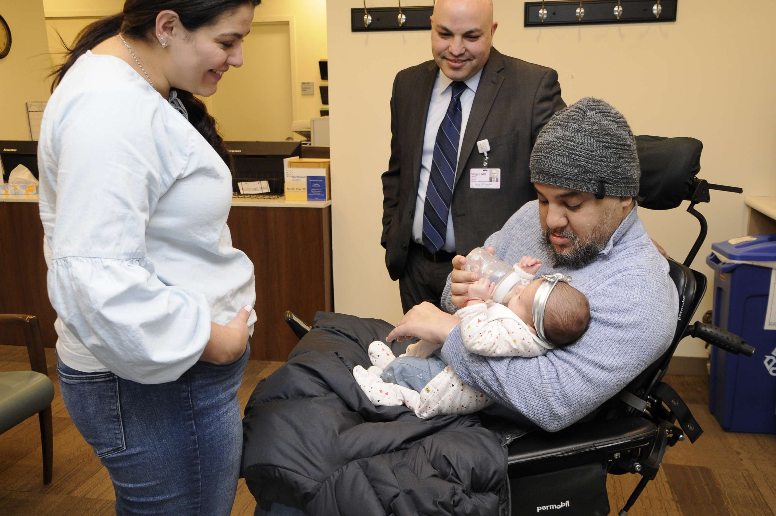PHOTO: Visnu Gonzalez and Sahily Machado pose with their daughter. Lia, and Dr. Tomer Singer of Lenox Hill Hospital in New York City.