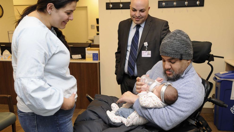 PHOTO: Visnu Gonzalez and Sahily Machado pose with their daughter. Lia, and Dr. Tomer Singer of Lenox Hill Hospital in New York City.