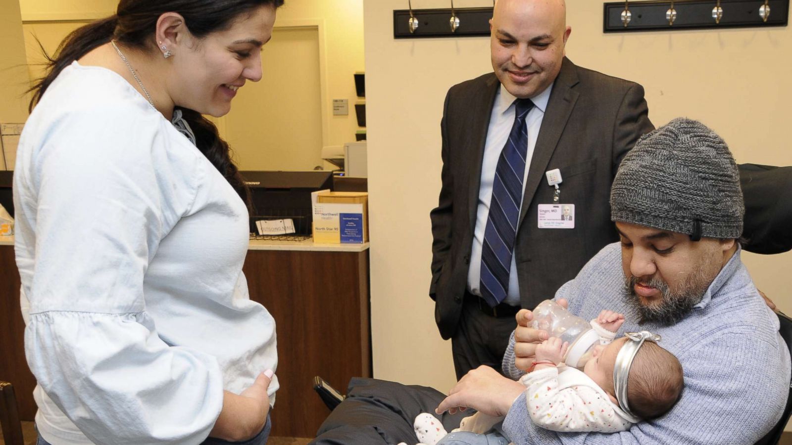 PHOTO: Visnu Gonzalez and Sahily Machado pose with their daughter. Lia, and Dr. Tomer Singer of Lenox Hill Hospital in New York City.