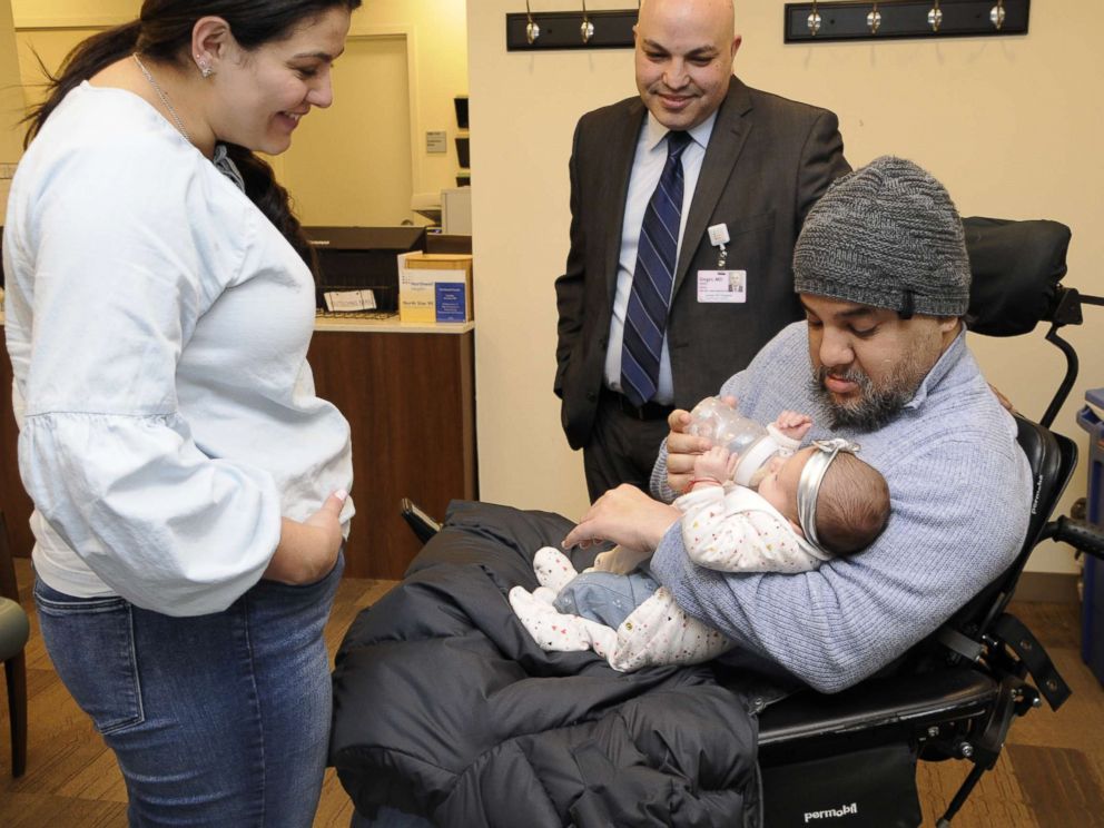 PHOTO: Visnu Gonzalez and Sahily Machado pose with their daughter. Lia, and Dr. Tomer Singer of Lenox Hill Hospital in New York City.