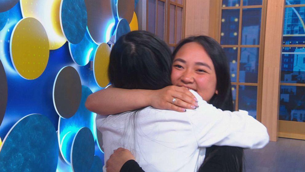 PHOTO: Limia Ravart and Hannah Raleigh embrace during their appearance on ABC's "Good Morning America" on May 25, 2022. Raleigh and Ravart didn't know they were sisters until they both took DNA tests and matched with each other.