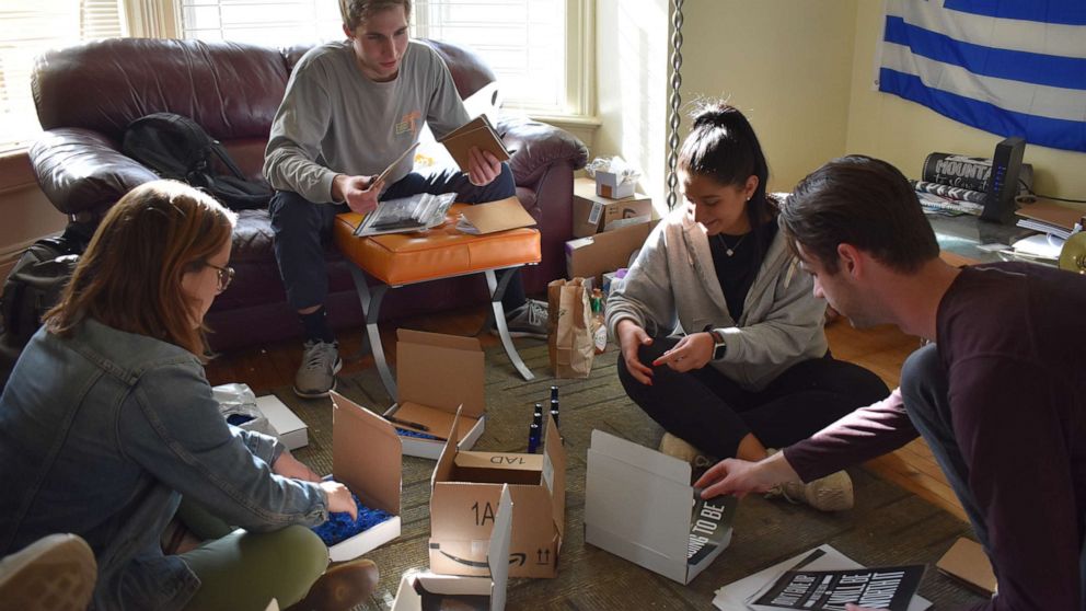 PHOTO: Mae Haggerty, Jonathan Constantine, Panagiota Roumeliotis and Isaac Haubrick-Feil assemble self-care boxes.