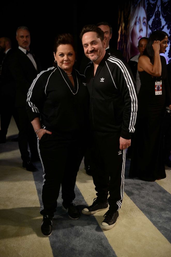 PHOTO: Melissa McCarthy and Ben Falcone pose at the 2019 Vanity Fair Oscar Party.