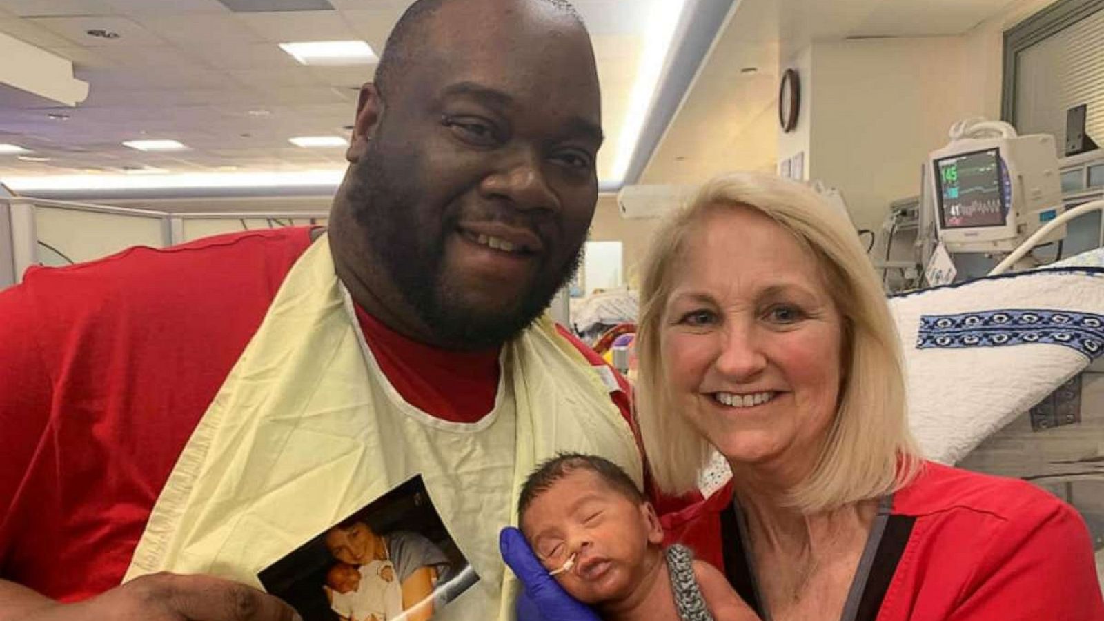 PHOTO: David Caldwell poses with his son Zayne and Lissa McGowan, the NICU nurse who cared for them both.