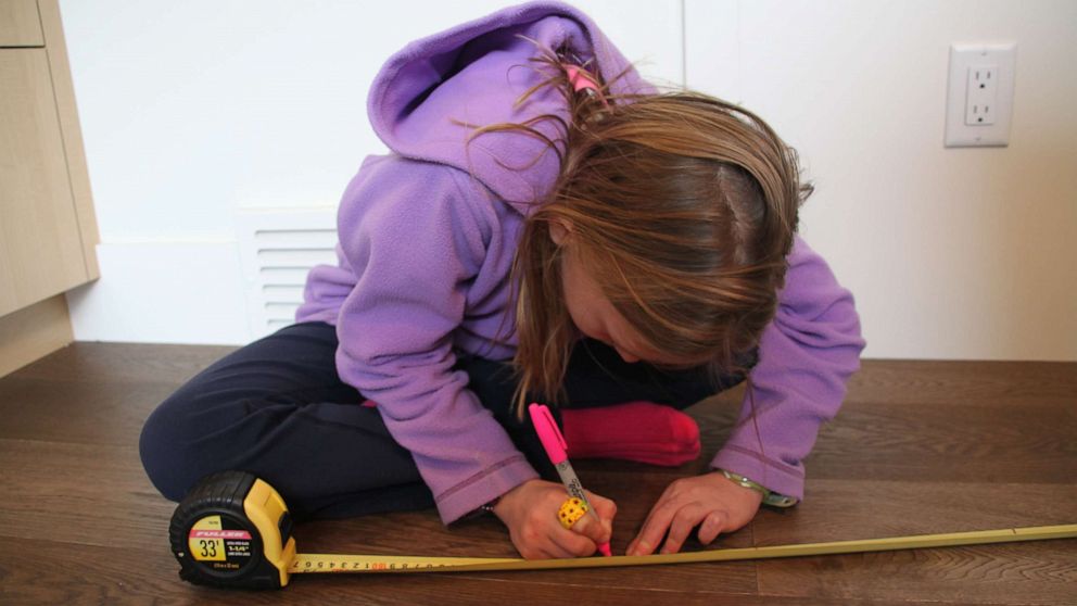 PHOTO: Nora Keegan, then 10, conducts her hand dryer experiment.