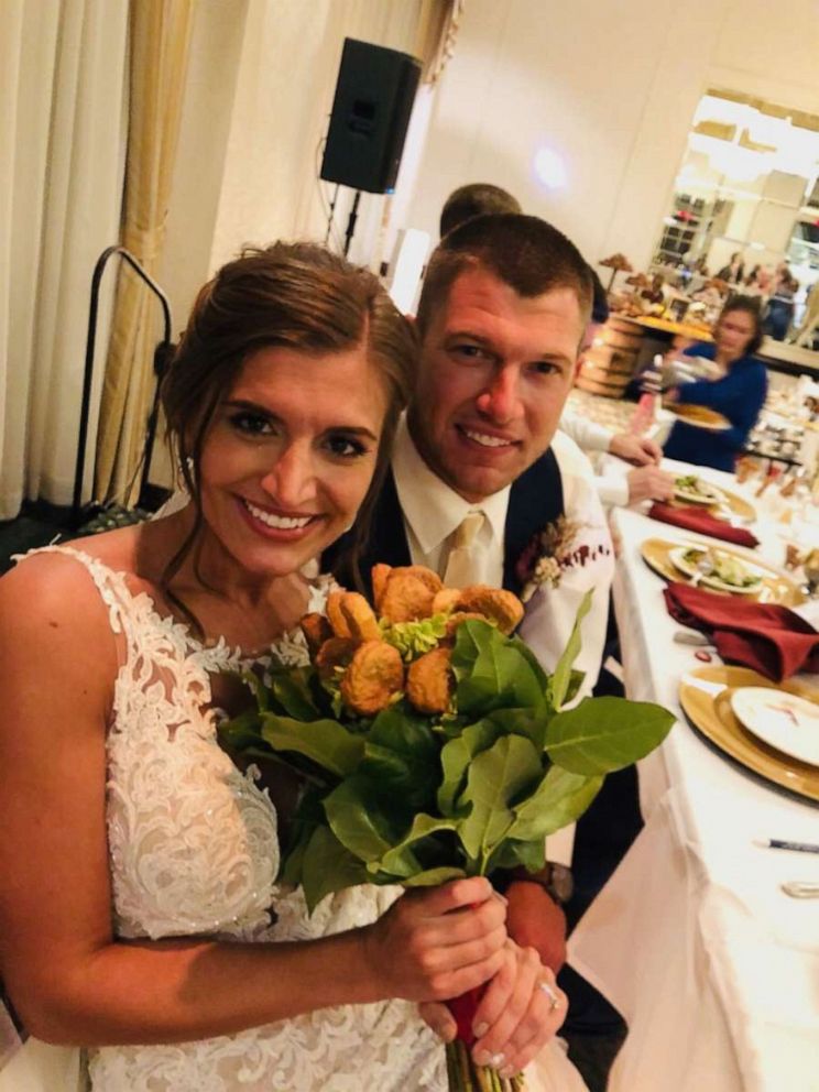 PHOTO: Blair and Adam Tyson got the surprise of a lifetime when they toasted with a chicken nugget bouquet supplied by the Tyson brand at their wedding reception on Oct. 12.