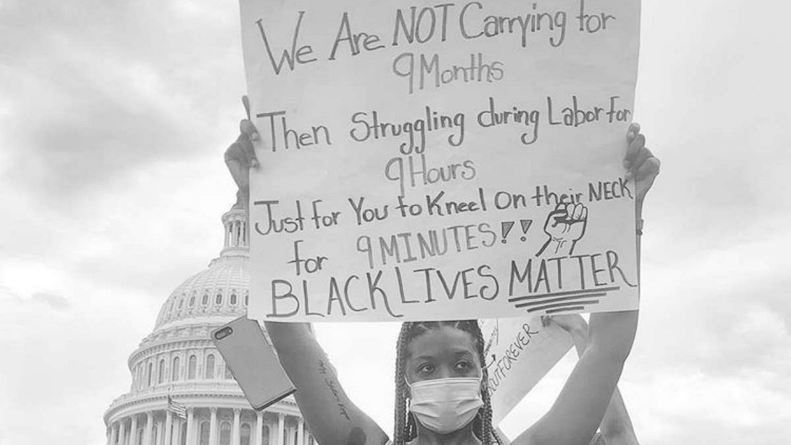 PHOTO: Thema, a 26-year-old pregnant woman, holds a handmade sign at a Black Lives Matter protest in Washington, D.C.