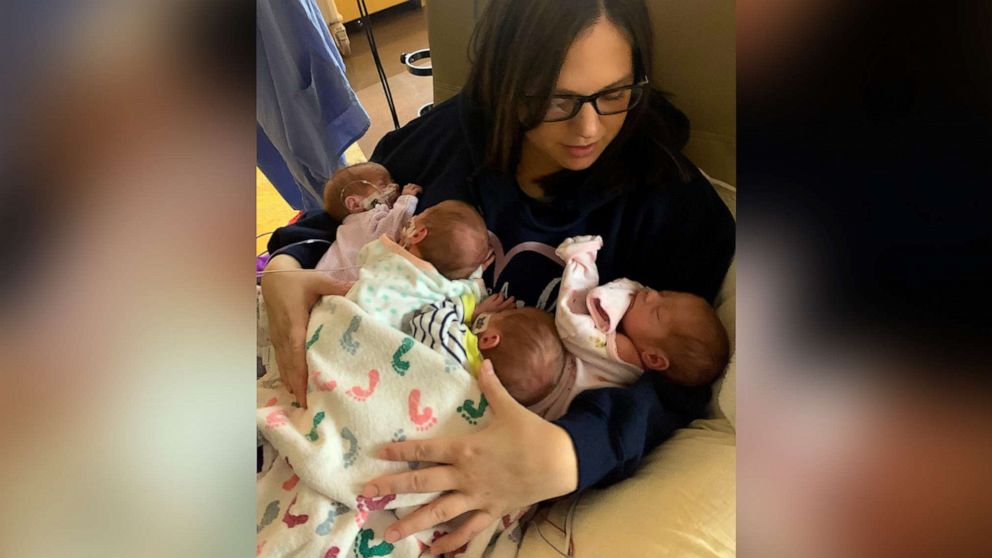 PHOTO: Taylor Becher, of Minnesota, holds her identical quadruplet daughters who were born on March 11, 2020.
