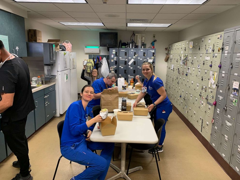 PHOTO: Hospital workers in South Carolina eat food donated through an effort started by Suzi Pigg, Whitney Klomparens and Leigh Ann Garrett.