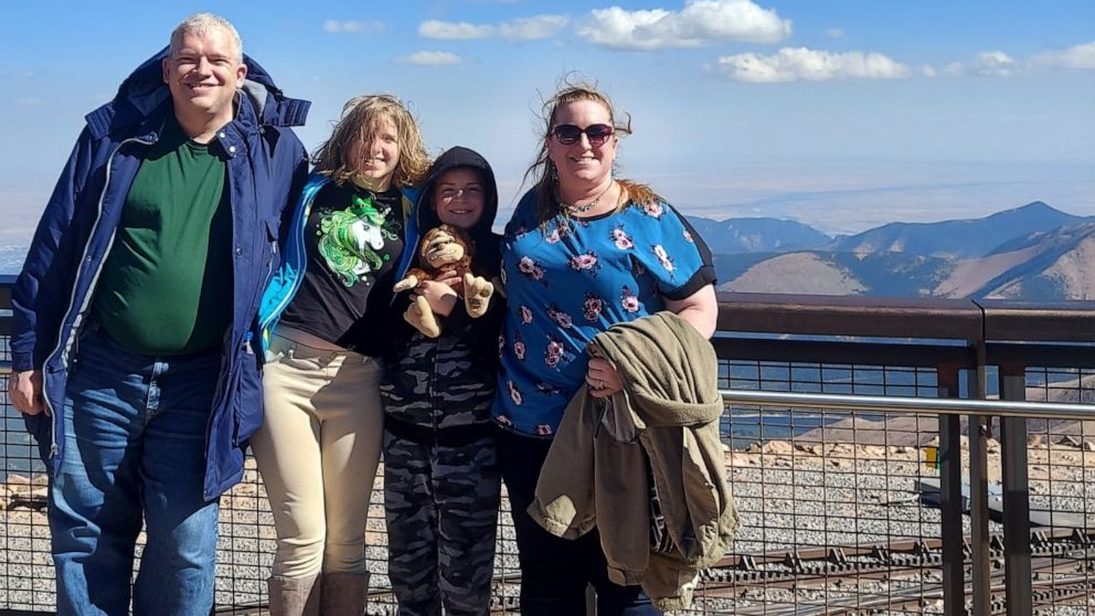 PHOTO: Tiffany Stockton, of Colorado, poses with her husband and two children.