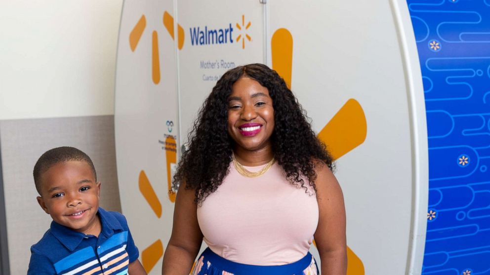 PHOTO: Tennille Webb poses with her son in front of a Mamava breastfeeding pod at a Walmart store.