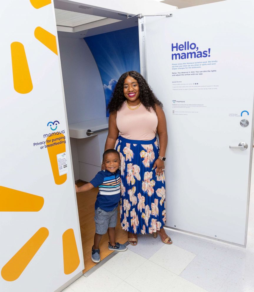 PHOTO: Tennille Webb poses with her son in front of a Mamava breastfeeding pod at a Walmart store.