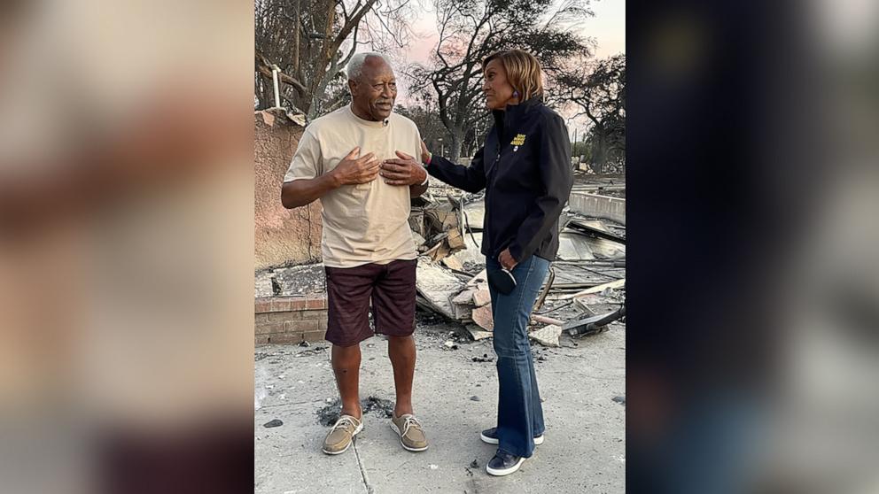 PHOTO: "Good Morning America" co-anchor Robin Roberts speaks with Walt Butler, who lost his home in a fire that broke out in Altadena, California.