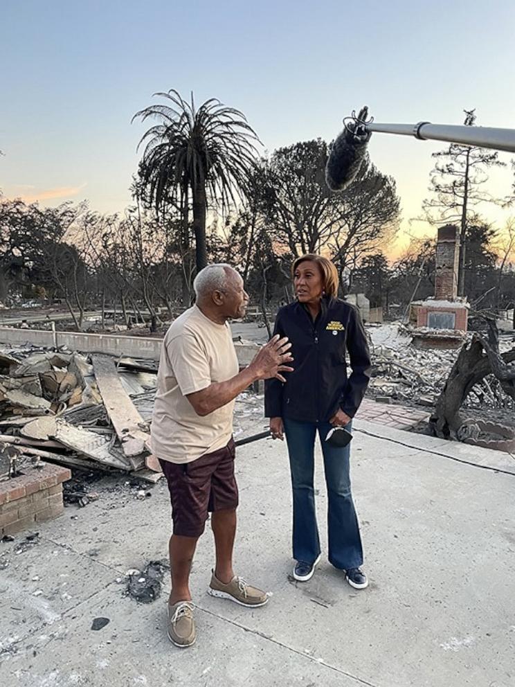 PHOTO: "Good Morning America" co-anchor Robin Roberts speaks with Walt Butler, who lost his home in a fire that broke out in Altadena, California.