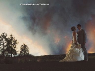 VIDEO: Michael Wolber and April Hartley posed for wedding photos during an Oregon wildfire.