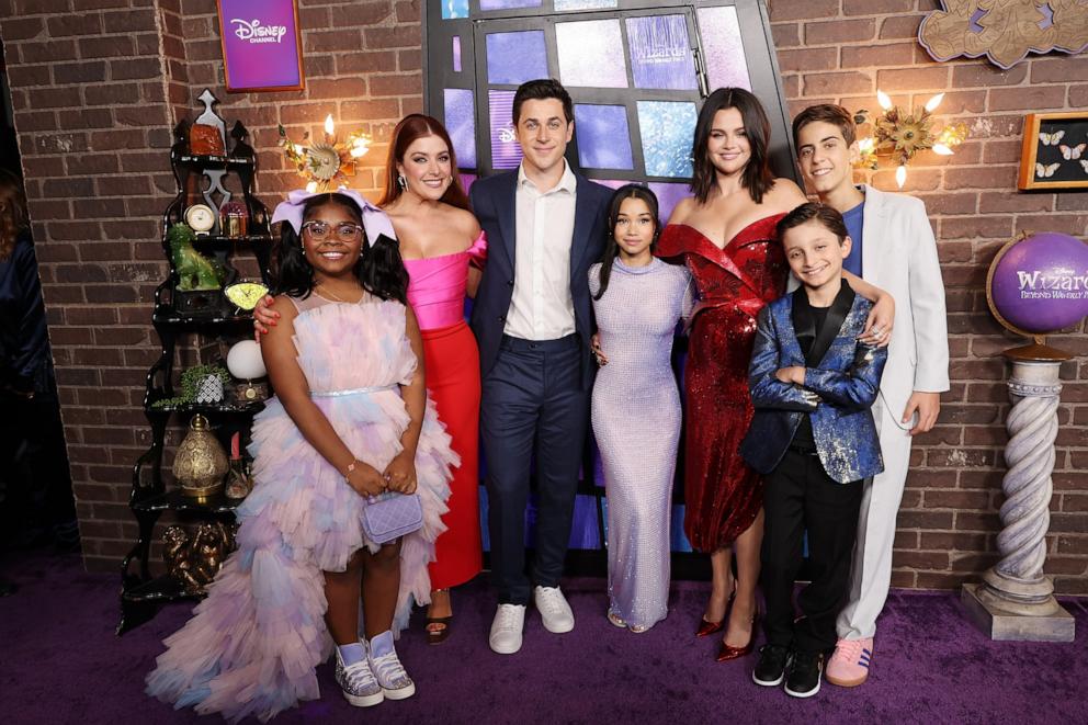 PHOTO: Taylor Cora, Mimi Gianopulos, David Henrie, Janice LeAnn Brown, Selena Gomez, Max Matenko and Alkaio Thiele attend the World Premiere of Disney's "Wizards Beyond Waverly Place" at El Capitan Theatre on Oct. 28, 2024 in Los Angeles.