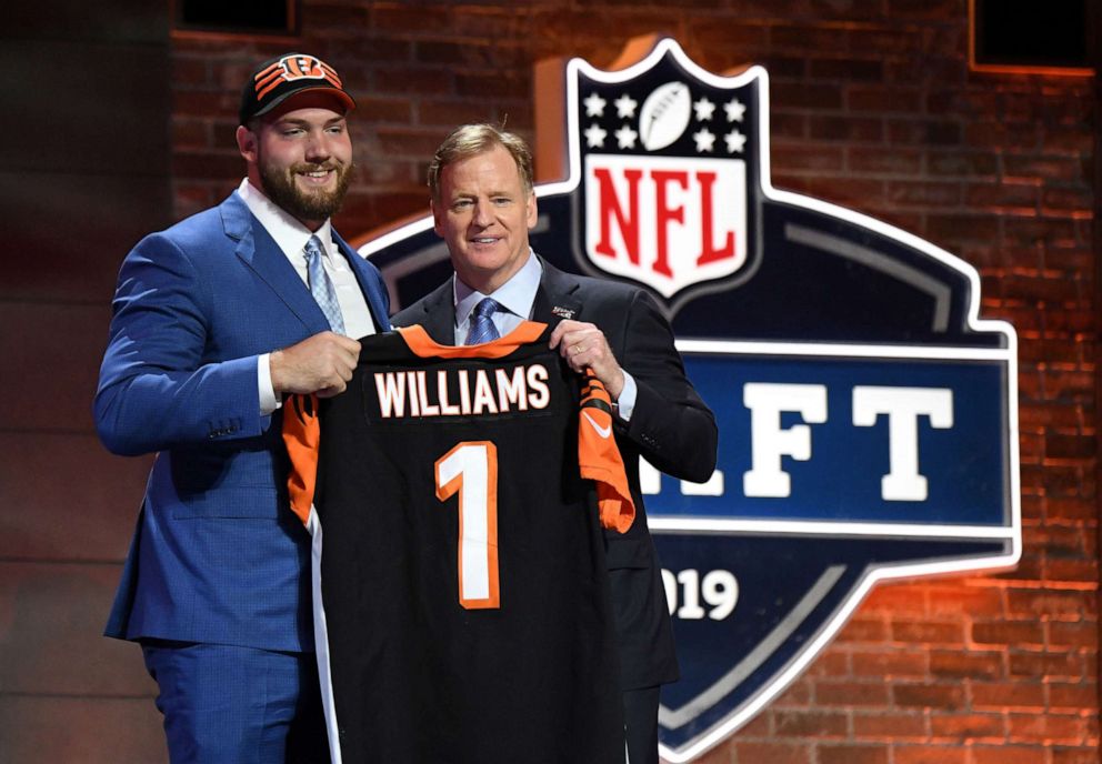 PHOTO: Jonah Williams poses for a photo with NFL commissioner Roger Goodell during the 2019 NFL Draft in Downtown Nashville, Apr 25, 2019.