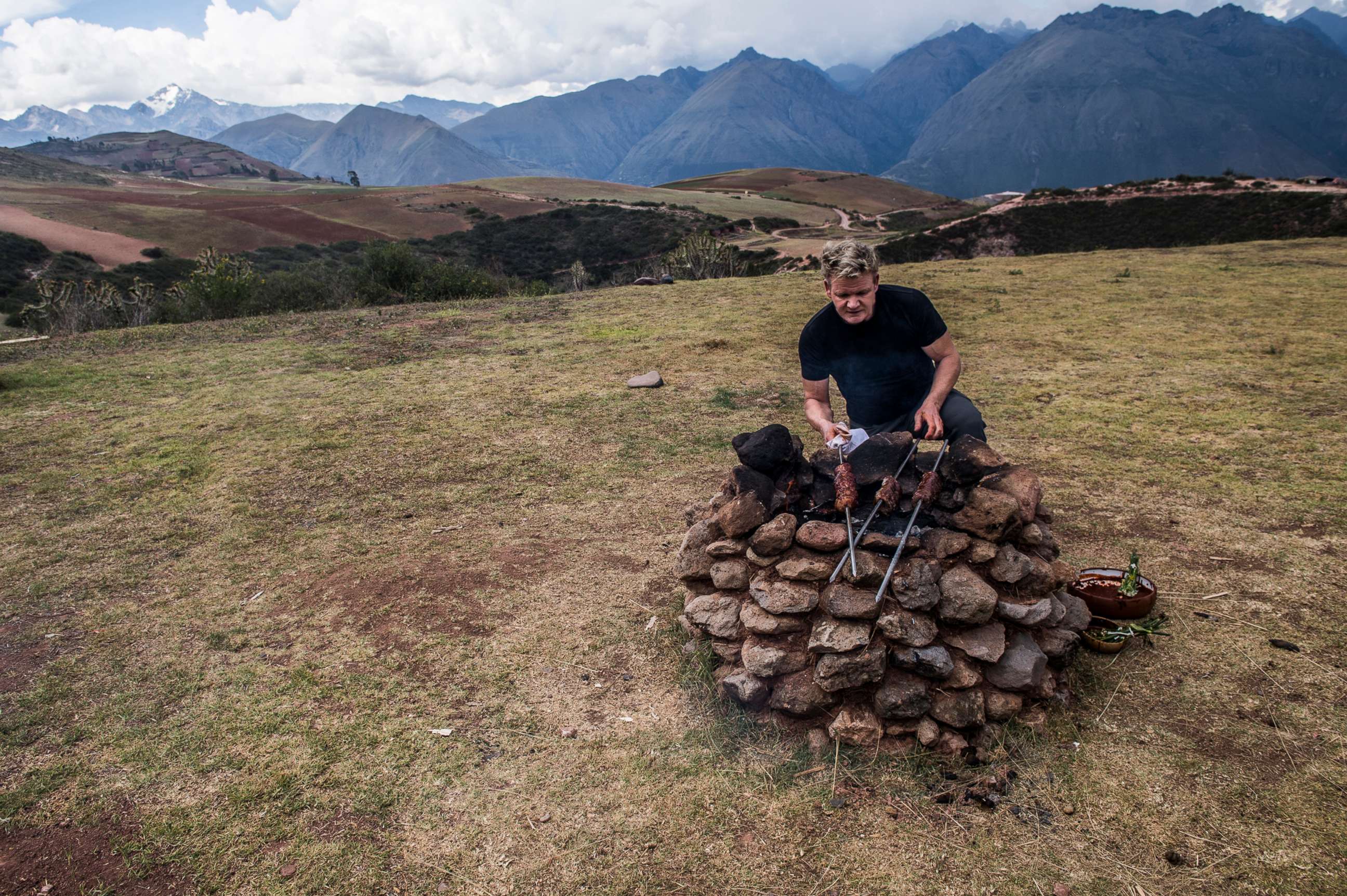 PHOTO: Gordon Ramsay cooks on an outdoor stove in Peru's Sacred Valley.