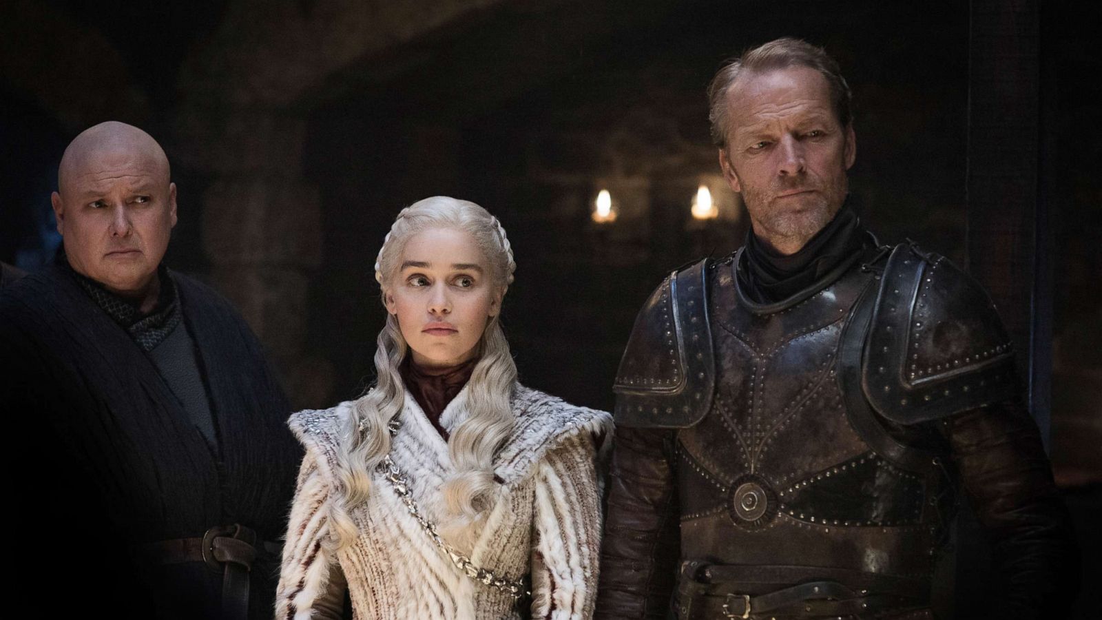 PHOTO: Conleth Hill, Emilia Clarke and Iain Glen in a scene from "Game of Thrones."