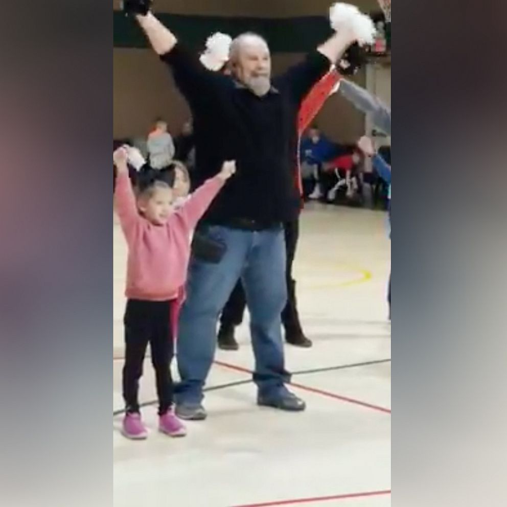 VIDEO: Grandpa wins hearts as dances with pom poms for granddaughter 