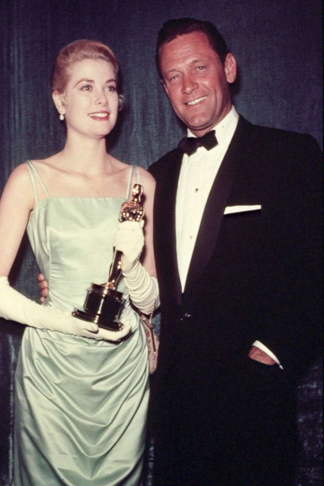 PHOTO: Grace Kelly and William Holden attend the 27th Academy Awards ceremony.