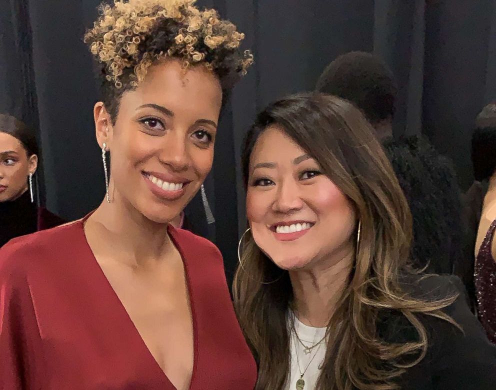 PHOTO: Grace Lee posing with designer Carly Cushnie after the fall 2019 Cushnie show.