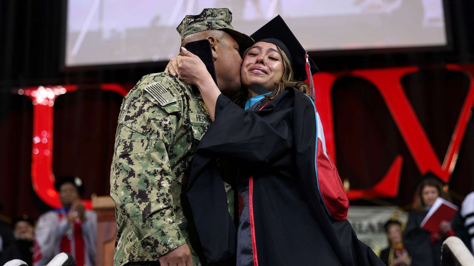 PHOTO: U.S. Navy Petty Officer Second Class Douglas Hernandez surprised his daughter Pamela as she graduated from the University of Nevada, Las Vegas.