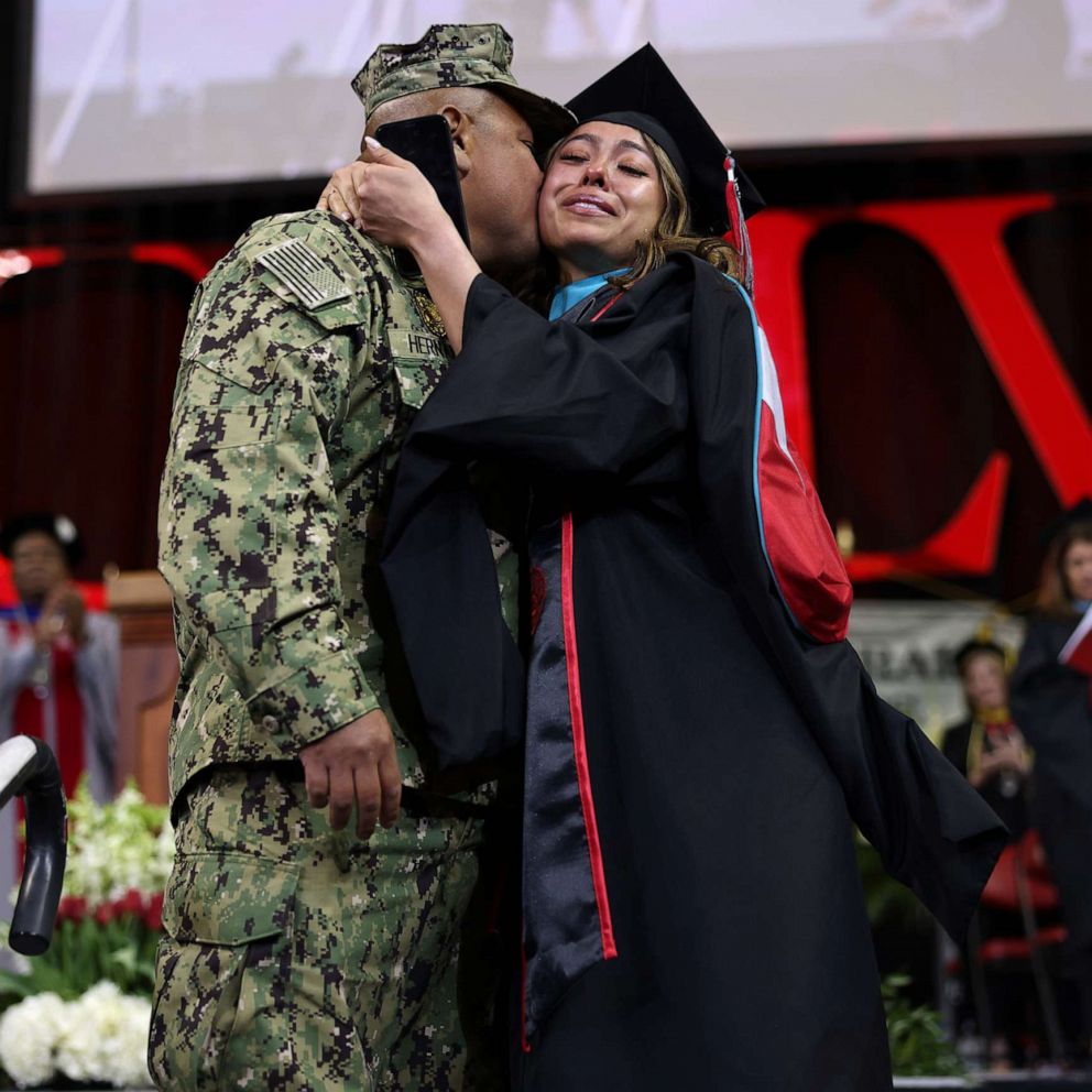 VIDEO: Navy father surprises daughter at college graduation 