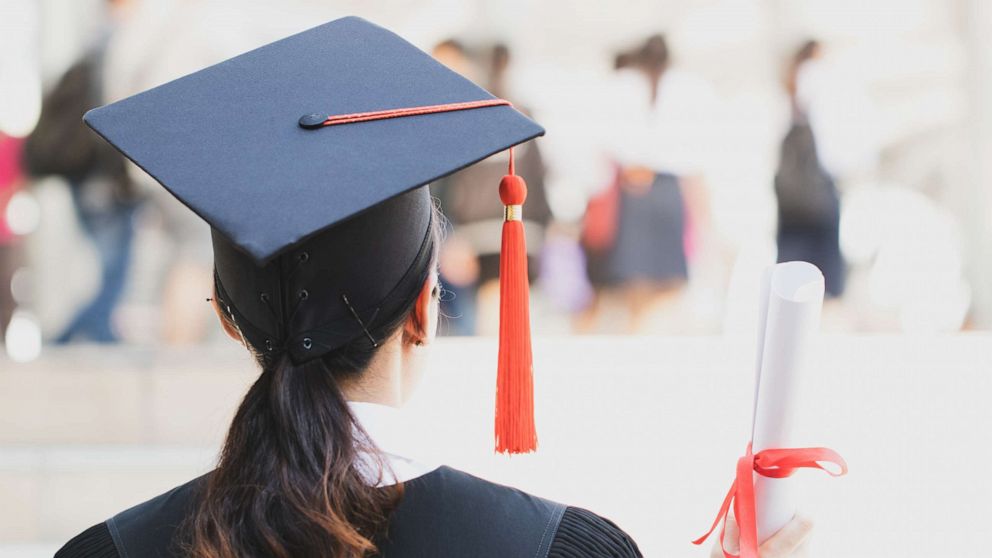 PHOTO: A woman is pictured graduating in a cap and gown in this undated photo. 