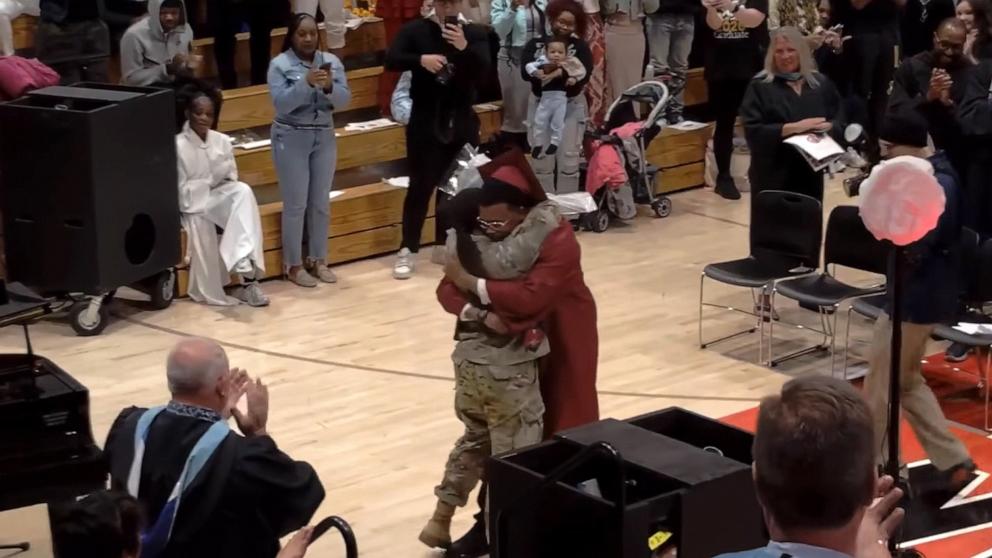 PHOTO: Specialist Barksdale surprised her younger brother Kalen Barksdale at his graduation.