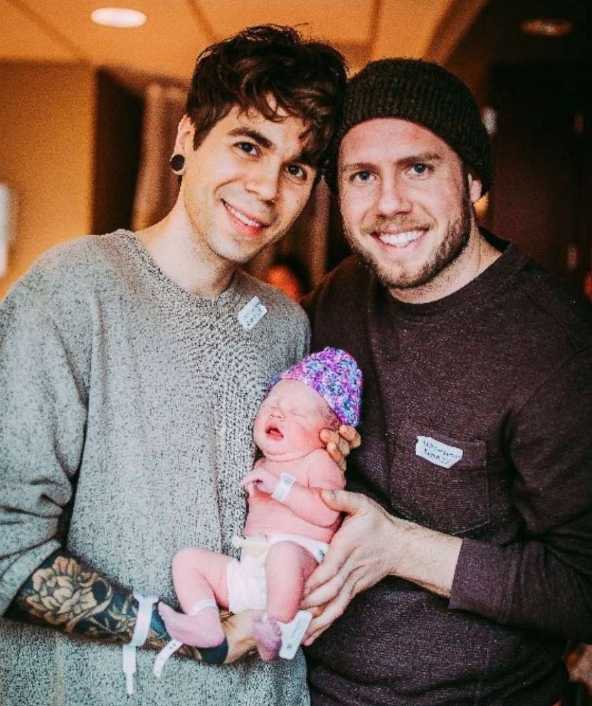 PHOTO: Elliot Dougherty and Matthew Eledge pose with their daughter, Uma Dougherty-Eledge.