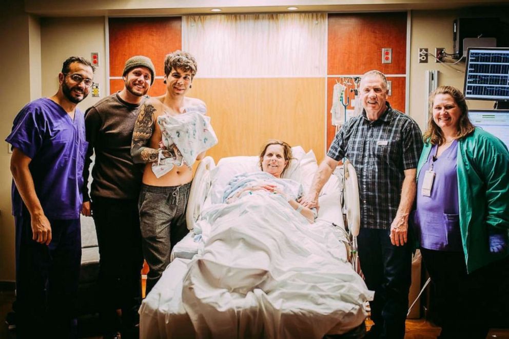 PHOTO: Ramzy Nakad, M.D., Matthew Eledge, Elliot Dougherty, Uma, Cecile Eledge, Kirk Eledge, and Robyn Stephen pose at at Nebraska Medical Center.