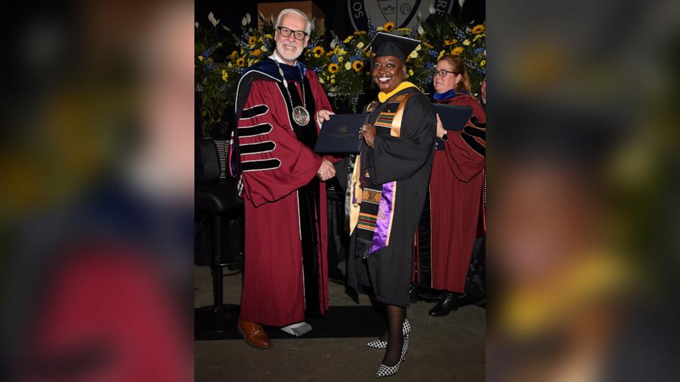 VIDEO: Grandmother of 33 graduates college at age 63