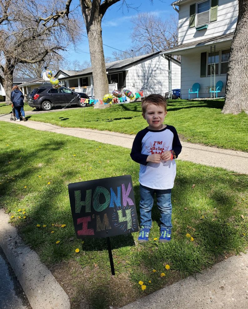 PHOTO: Murphy Stammer's grandmother and grandfather traveled 140 miles for a seconds-long curbside celebration in honor of his birthday April 20, in Des Moines, Iowa.